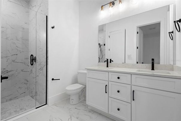 Bathroom, Dual Sink Vanities, Glass Shower, Interior, Marble, Marble Walls
