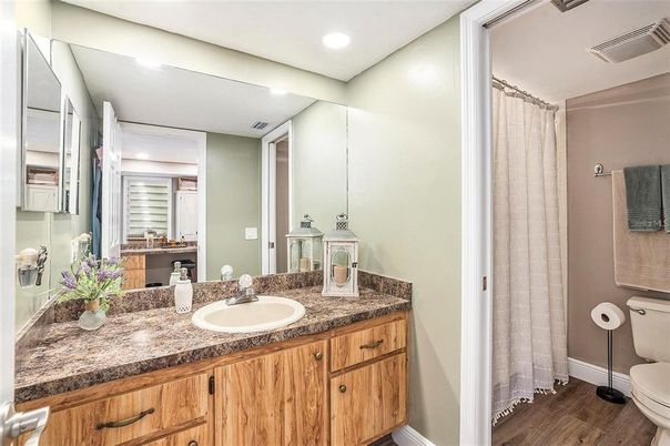 Bathroom, Dual Sink Vanities, Interior, Recessed Lighting, Wood Texture Flooring