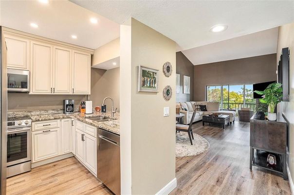Interior, Kitchen, Living room, Recessed Lighting, Stainless Steel Appliances, Wood Texture Flooring
