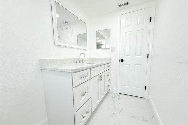Bathroom, Dual Sink Vanities, Interior, Marble, Recessed Lighting