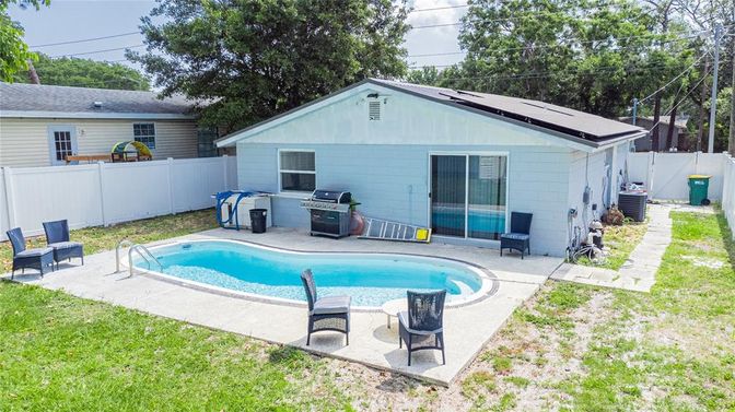 Exterior, Pool, Solar Panels