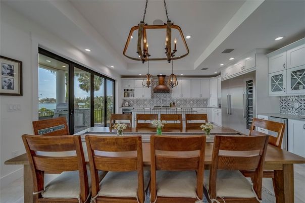 Chandelier, Dining room, Interior, Kitchen, Pendant Lights, Recessed Lighting, Stainless Steel Appliances