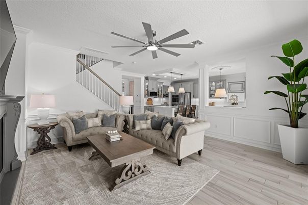 Fireplace, Interior, Kitchen, Living room, Pendant Lights, Recessed Lighting, Stainless Steel Appliances, Wood Texture Flooring