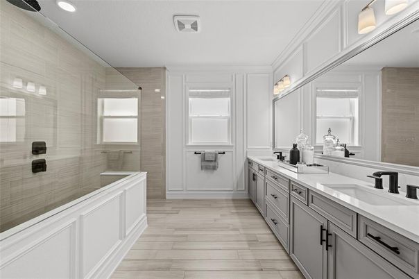 Bathroom, Dual Sink Vanities, Glass Shower, Interior, Recessed Lighting, Wood Texture Flooring