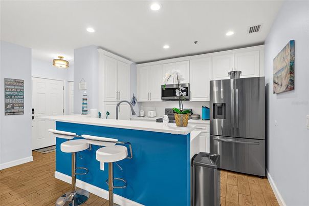 Interior, Kitchen, Recessed Lighting, Stainless Steel Appliances, Wood Texture Flooring
