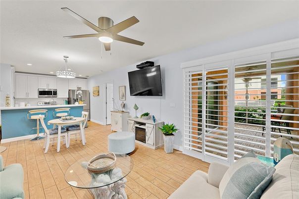 Dining room, Fireplace, Interior, Kitchen, Pendant Lights, Recessed Lighting, Stainless Steel Appliances, Wood Texture Flooring