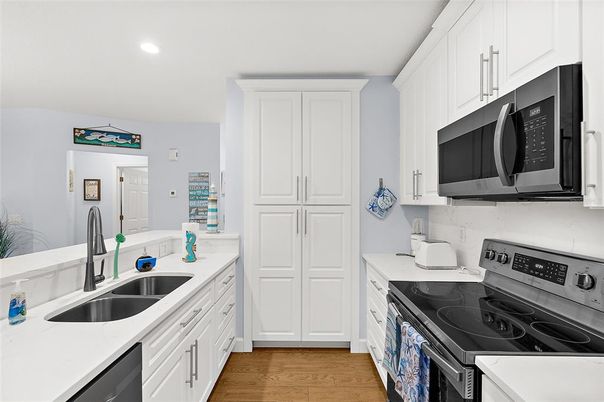 Interior, Kitchen, Recessed Lighting, Stainless Steel Appliances, Wood Texture Flooring