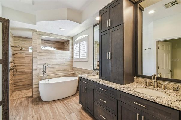 Bathroom, Dual Sink Vanities, Free Standing Baths, Interior, Recessed Lighting, Wood Texture Flooring