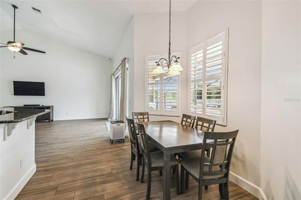 Chandelier, Dining room, Interior, Pendant Lights, Wood Texture Flooring