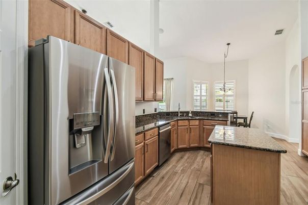 Dining room, Interior, Kitchen, Pendant Lights, Stainless Steel Appliances, Wood Texture Flooring