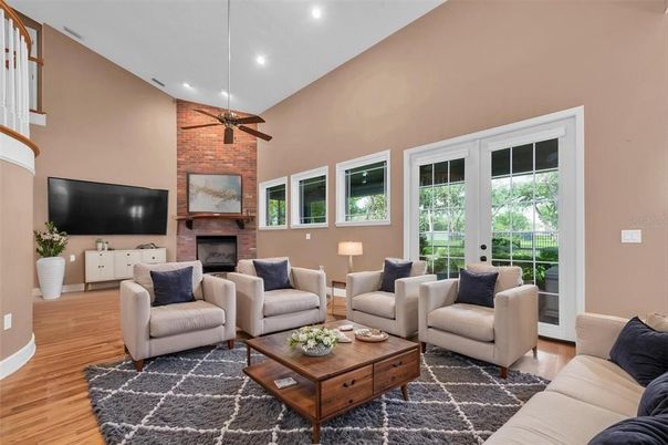 Fireplace, Interior, Living room, Recessed Lighting, Stone Walls, Wood Texture Flooring