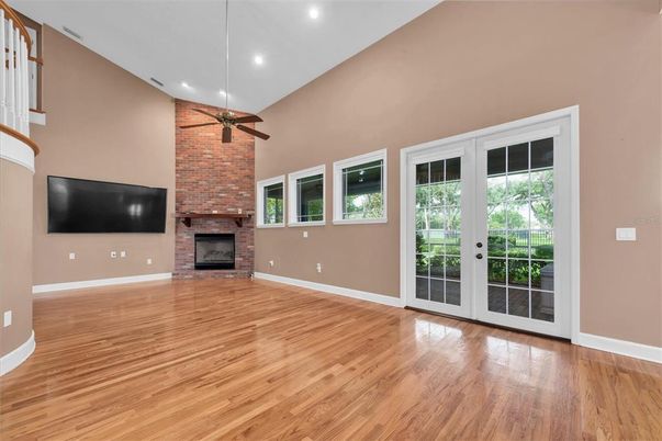 Empty room, Fireplace, Interior, Recessed Lighting, Stone Walls, Wood Texture Flooring