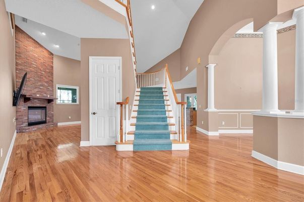 Fireplace, Interior, Recessed Lighting, Stone Walls, Wood Texture Flooring
