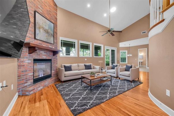 Fireplace, Interior, Living room, Pendant Lights, Recessed Lighting, Stone Walls, Wood Texture Flooring