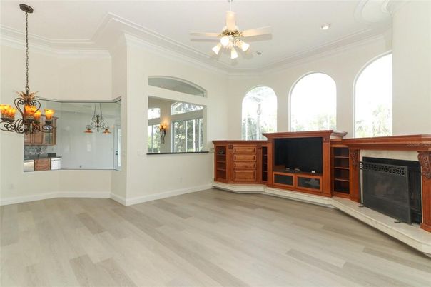 Chandelier, Fireplace, Interior, Recessed Lighting, Wood Texture Flooring