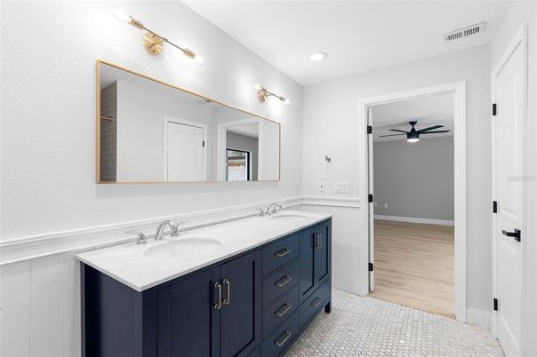 Bathroom, Dual Sink Vanities, Interior, Recessed Lighting, Wood Texture Flooring