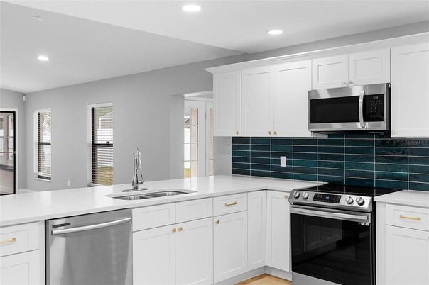 Interior, Kitchen, Recessed Lighting, Stainless Steel Appliances, Wood Texture Flooring