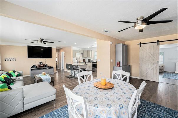 Dining room, Interior, Kitchen, Living room, Recessed Lighting, Stainless Steel Appliances, Wood Texture Flooring