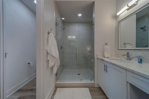 Bathroom, Glass Shower, Interior, Recessed Lighting, Wood Texture Flooring