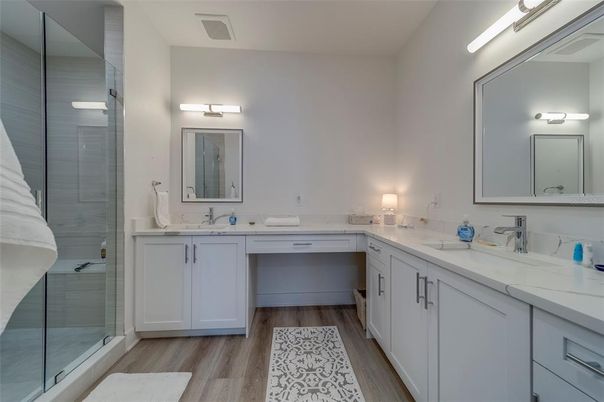 Bathroom, Dual Sink Vanities, Glass Shower, Interior, Wood Texture Flooring