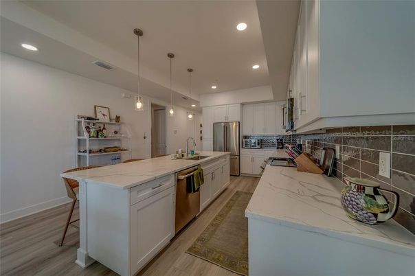 Interior, Kitchen, Pendant Lights, Recessed Lighting, Stainless Steel Appliances, Wood Texture Flooring