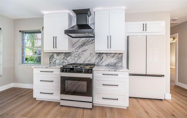 Interior, Kitchen, Marble Walls, Stainless Steel Appliances, Wood Texture Flooring