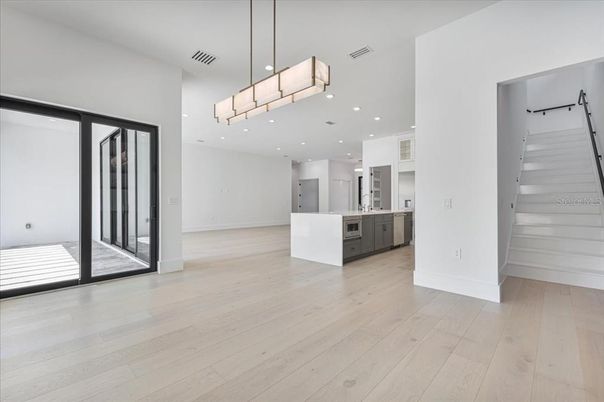 Chandelier, Empty room, Interior, Kitchen, Pendant Lights, Recessed Lighting, Wood Texture Flooring