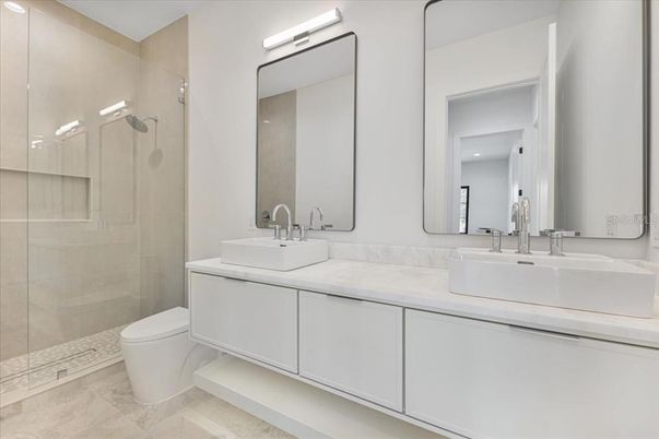 Bathroom, Dual Sink Vanities, Glass Shower, Interior, Recessed Lighting