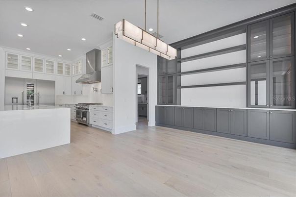 Chandelier, Interior, Kitchen, Pendant Lights, Recessed Lighting, Stainless Steel Appliances, Wood Texture Flooring