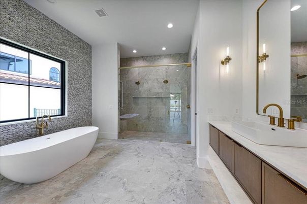 Bathroom, Dual Sink Vanities, Free Standing Baths, Glass Shower, Interior, Marble, Marble Walls, Recessed Lighting