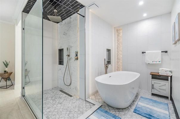 Bathroom, Free Standing Baths, Glass Shower, Interior, Marble Walls, Recessed Lighting
