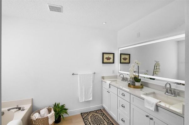 Bathroom, Dual Sink Vanities, Interior, Recessed Lighting, Wood Texture Flooring