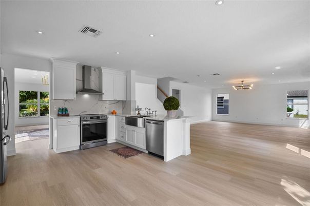 Interior, Kitchen, Pendant Lights, Recessed Lighting, Stainless Steel Appliances, Wood Texture Flooring