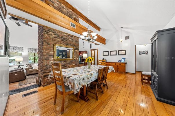 Dining room, Fireplace, Interior, Pendant Lights, Stone Walls, Wooden Beams, Wood Texture Flooring