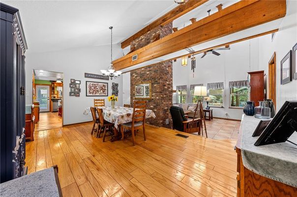 Chandelier, Dining room, Interior, Pendant Lights, Stone Walls, Wooden Beams, Wood Texture Flooring