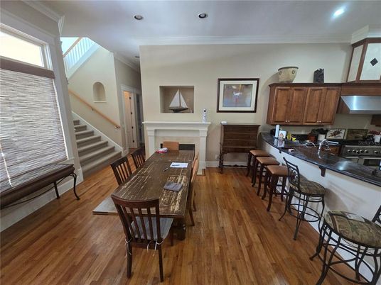 Dining room, Fireplace, Interior, Kitchen, Recessed Lighting, Wood Texture Flooring