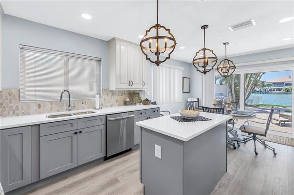 Chandelier, Dining room, Interior, Kitchen, Pendant Lights, Recessed Lighting, Water, Wood Texture Flooring