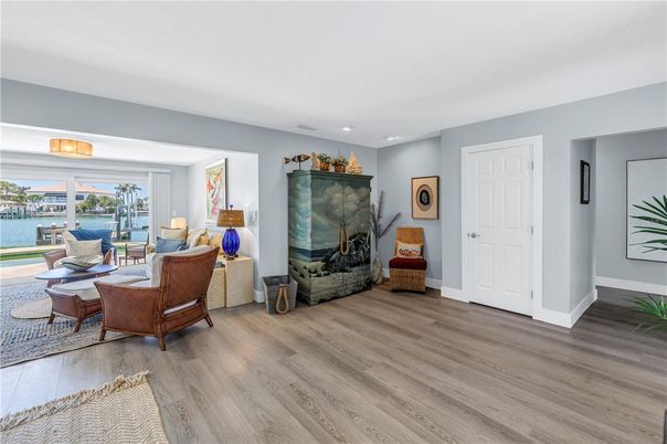 Fireplace, Interior, Living room, Recessed Lighting, Water, Wood Texture Flooring