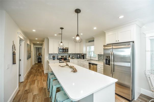 Interior, Kitchen, Pendant Lights, Recessed Lighting, Stainless Steel Appliances, Wood Texture Flooring