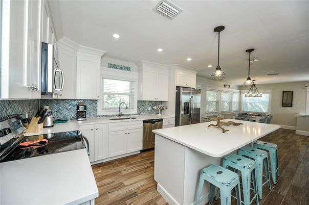 Interior, Kitchen, Pendant Lights, Recessed Lighting, Stainless Steel Appliances, Wood Texture Flooring
