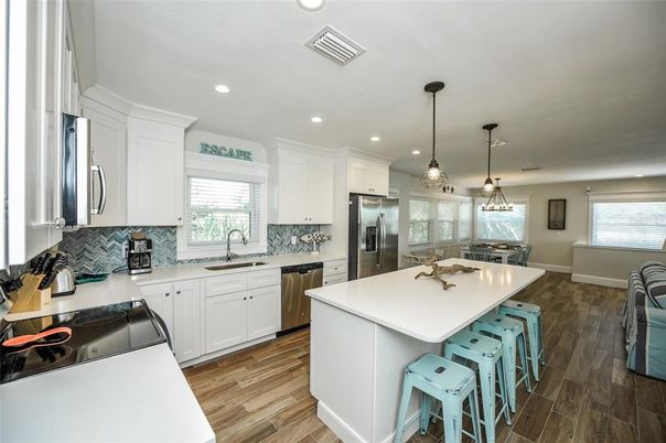 Interior, Kitchen, Pendant Lights, Recessed Lighting, Stainless Steel Appliances, Wood Texture Flooring