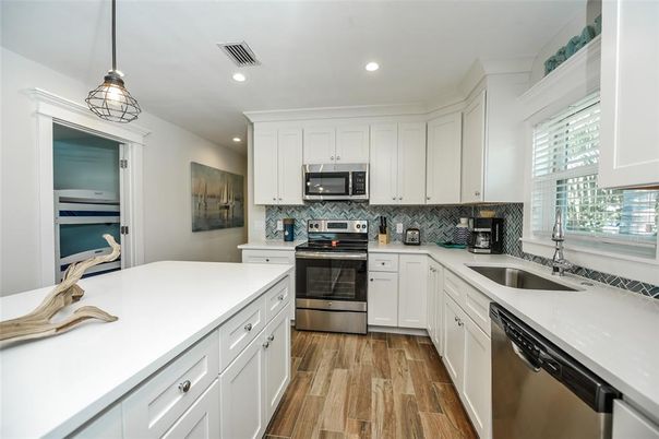 Interior, Kitchen, Pendant Lights, Recessed Lighting, Stainless Steel Appliances, Wood Texture Flooring