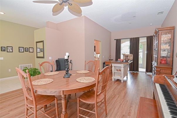 Dining room, Interior, Piano, Recessed Lighting, Wood Texture Flooring