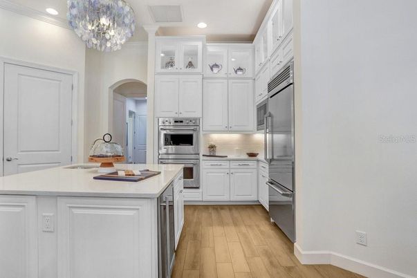 Chandelier, Interior, Kitchen, Recessed Lighting, Stainless Steel Appliances, Wood Texture Flooring