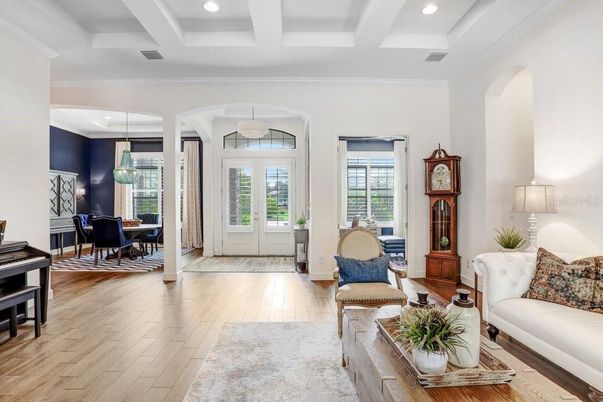 Dining room, Interior, Living room, Pendant Lights, Piano, Recessed Lighting, Wood Texture Flooring