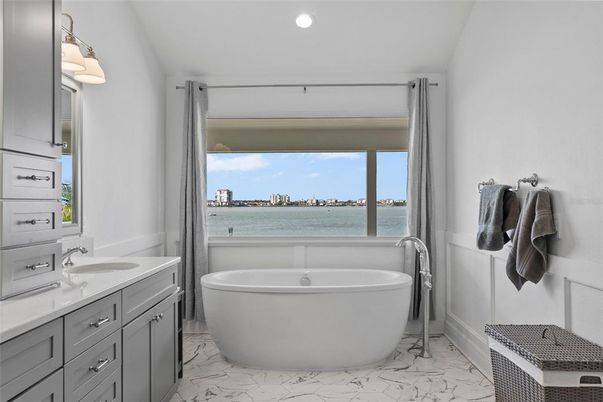 Bathroom, Dual Sink Vanities, Free Standing Baths, Interior, Marble, Recessed Lighting, Water