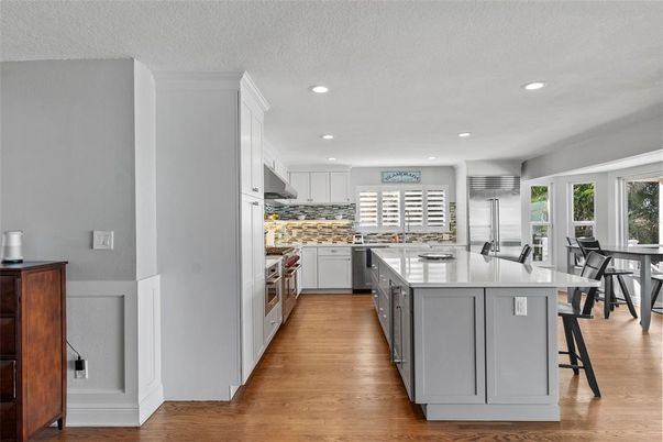 Interior, Kitchen, Recessed Lighting, Stainless Steel Appliances, Wood Texture Flooring