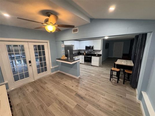 Interior, Kitchen, Recessed Lighting, Stainless Steel Appliances, Wood Texture Flooring