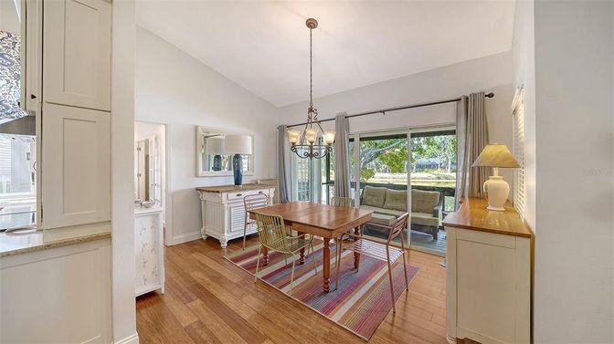 Chandelier, Dining room, Interior, Pendant Lights, Wood Texture Flooring