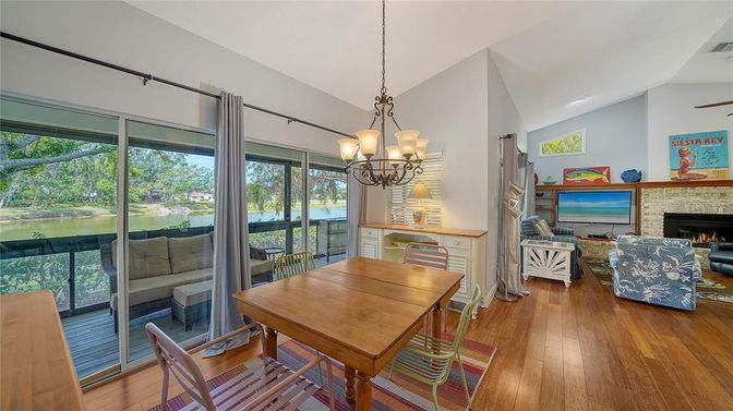 Chandelier, Dining room, Fireplace, Interior, Living room, Wood Texture Flooring